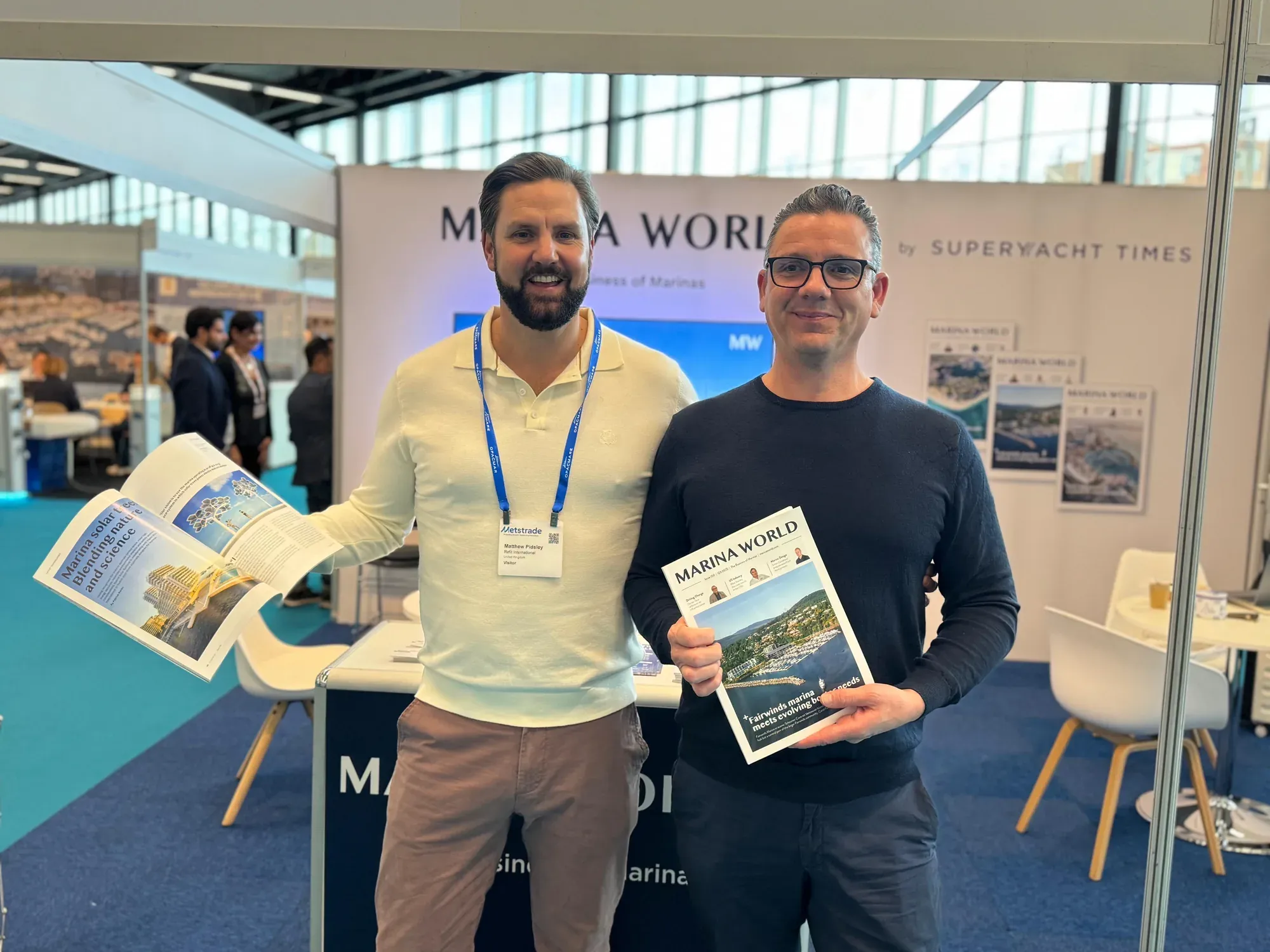 Hybrid Solar Systems at the Marina World stand, holding the magazine